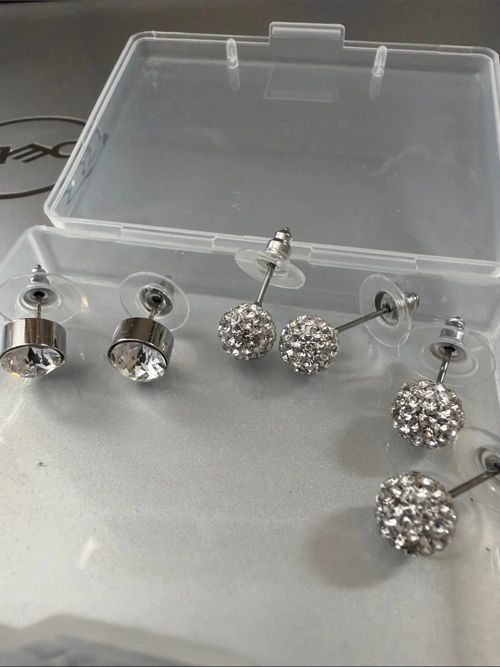 4 pairs sparkle studs. Never worn. So cute and sparkly.